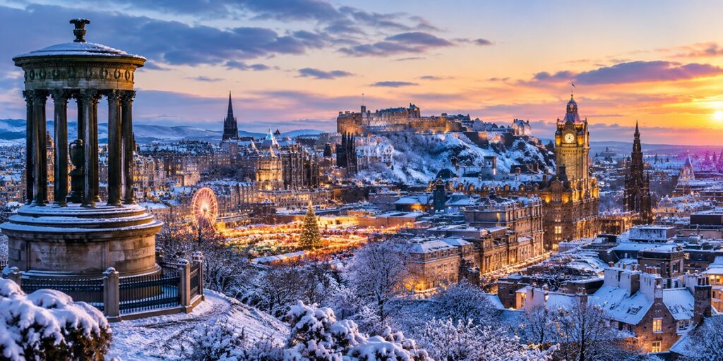 Edinburgh Old Town and castle dusted with snow in winter.