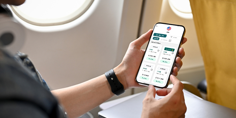 person using Airhub's USA eSIM plans in phone